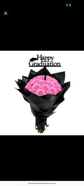 Pink roses graduation bouquet by Ward and Haneen featuring vibrant pink roses arranged in a celebratory bouquet.