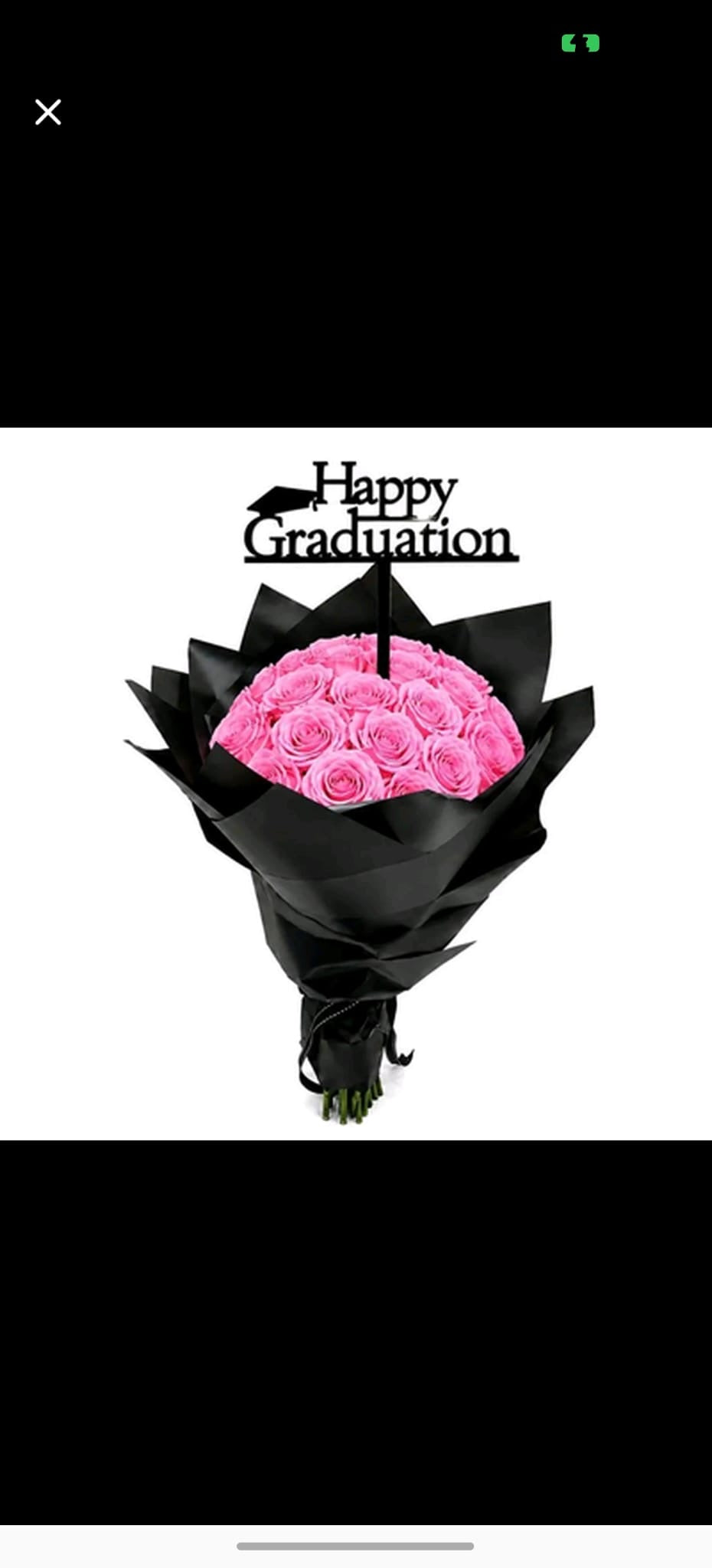 Pink roses graduation bouquet by Ward and Haneen featuring vibrant pink roses arranged in a celebratory bouquet.