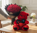 Red rose and plush teddy bear gift set from Ward and Haneen, featuring a vibrant red rose bouquet and a soft stuffed teddy bear.