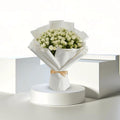 Ivory Whisper 50 stems baby roses by Ward and Haneen, fresh floral bouquet with delicate ivory blossoms, natural and elegant.