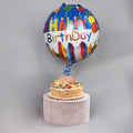 Colorful Fruit & Foil Birthday Set by Ward and Haneen featuring balloons, banners, and decorative foil accessories for celebration.