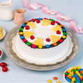 Ward and Haneen Pineapple Gems Cake in 6-inch and 8-inch sizes, decorated with pineapple-themed icing and colorful gems.