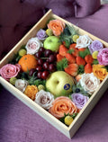 Wooden box from The Bloom & Bounty collection by Ward and Haneen, featuring intricate floral carvings and a rustic finish.