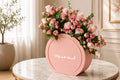 Pink rose congratulations flower box by Ward and Haneen with vibrant pink roses arranged in a stylish gift box.