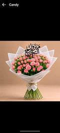 Pink baby roses graduation bouquet from Ward and Haneen, showcasing delicate pink roses arranged in a celebratory bouquet.