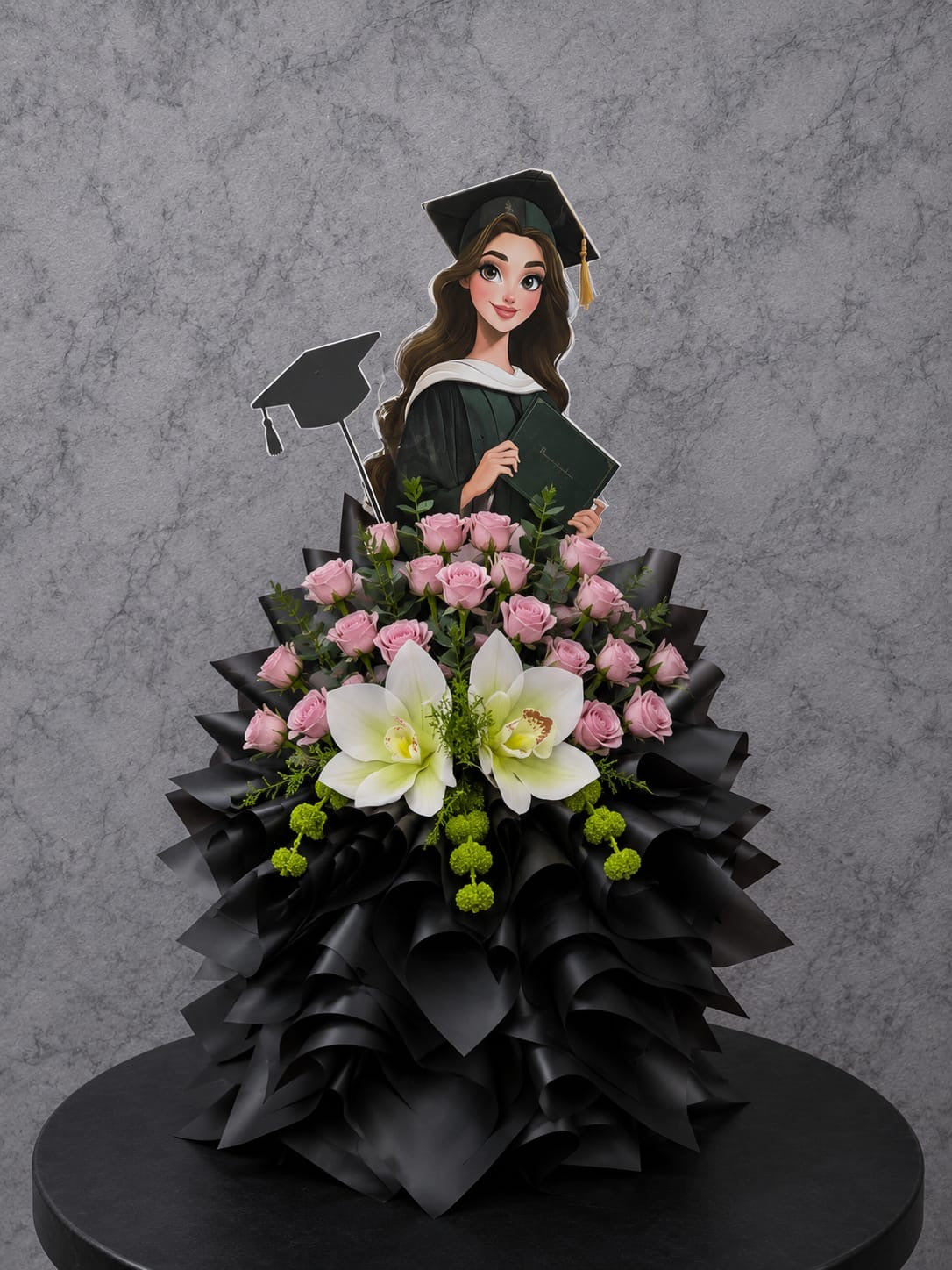 Graduation Bloom Elegance floral arrangement by Ward and Haneen featuring vibrant blooms for graduation celebrations.