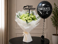 White baby roses and a "Congrats" balloon in the Ward and Haneen graduation gift set, ideal for celebrating academic achievement.