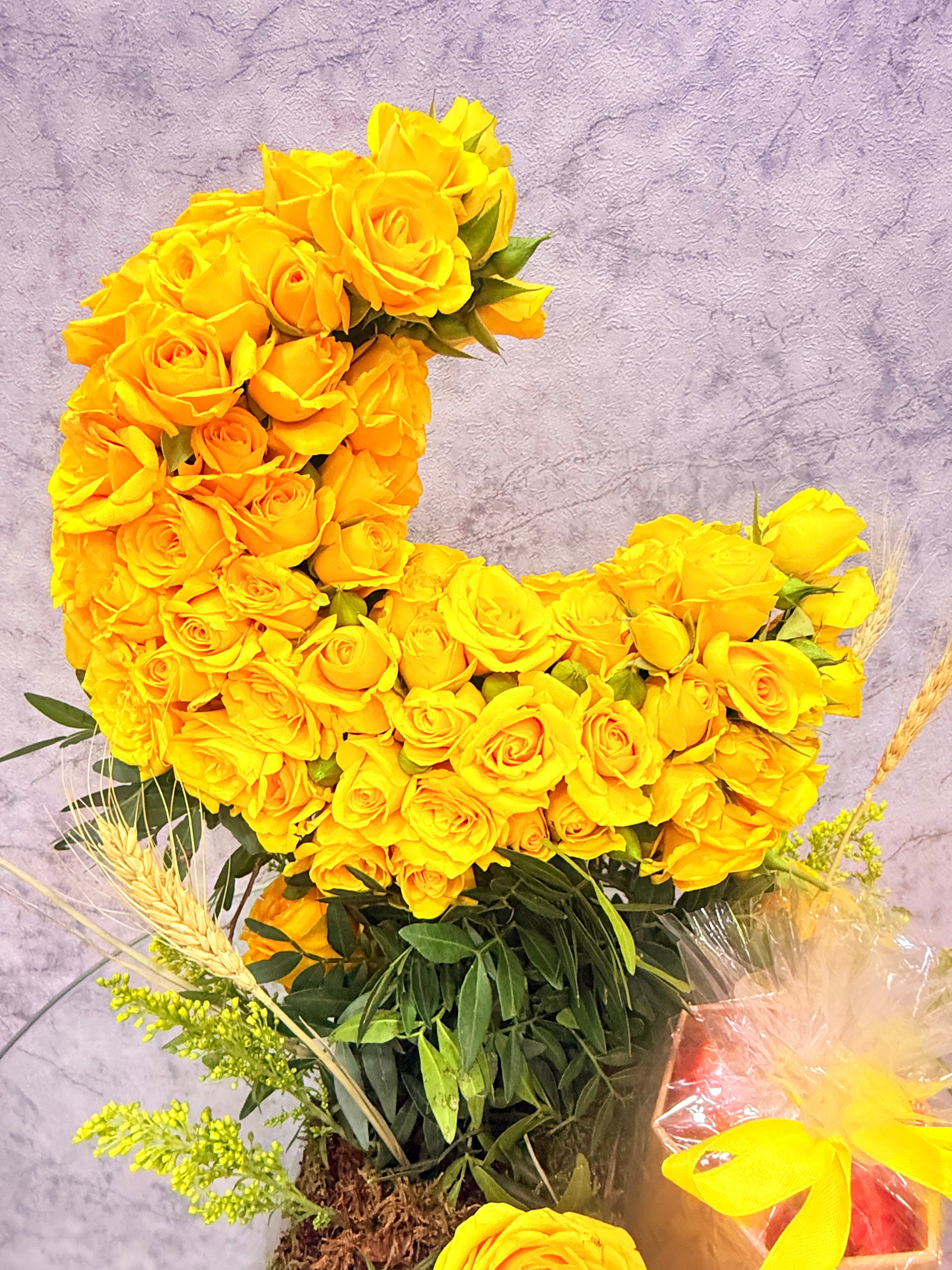 Ramadan Radiance floral and festive gift set by Ward and Haneen, featuring beautifully arranged flowers and elegant packaging.
