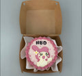 My Melody birthday cake with colorful decorations and a cute character topper from Ward and Haneen.
