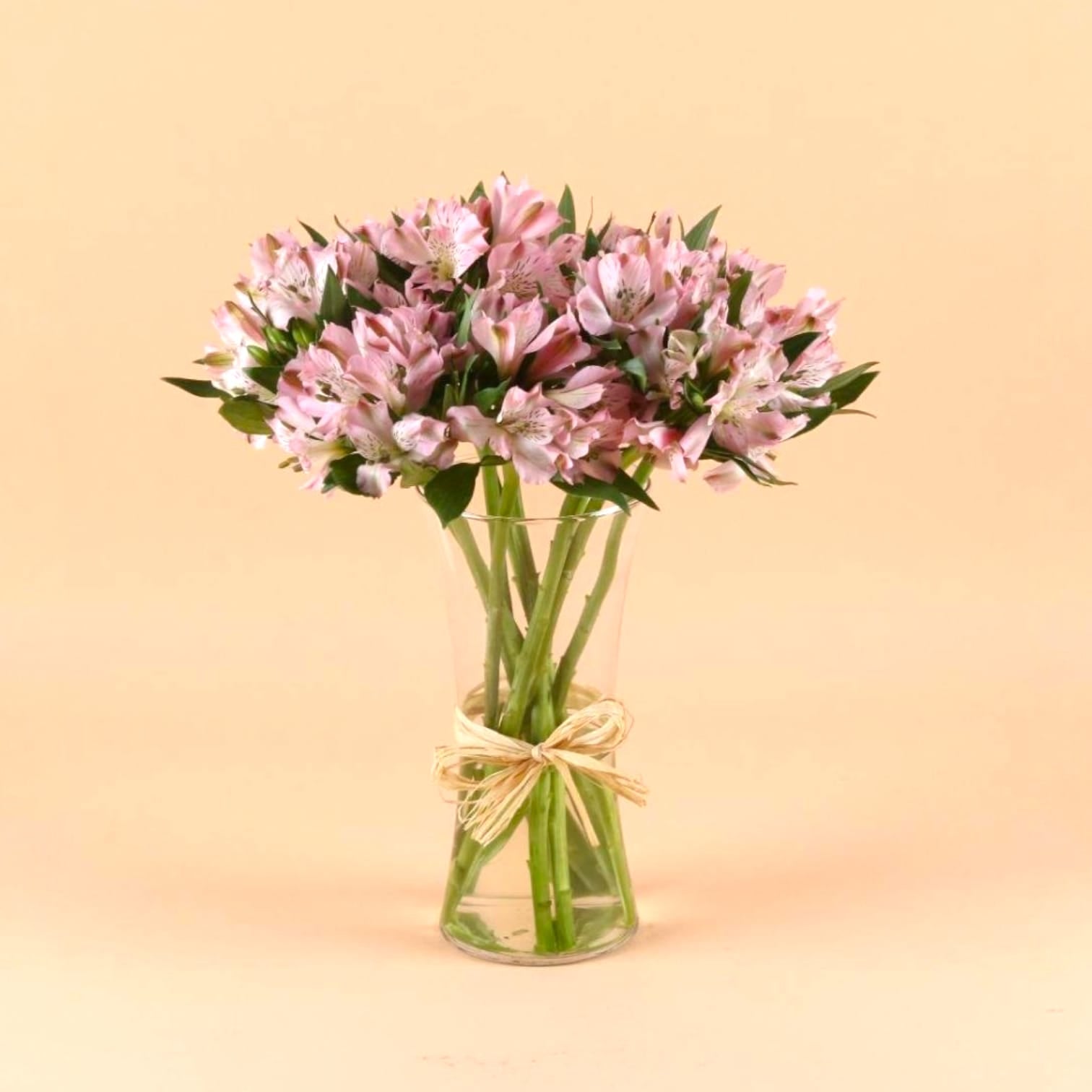 Astro pink in clear vase