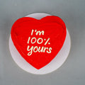 Red I’M 100% Yours mini bento cake by Ward and Haneen, featuring a colorful, layered dessert with decorative toppings.