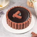 Ward and Haneen KitKat Fantasy Birthday Anniversary Cake with colorful decorations and chocolate layers, perfect for celebrations.