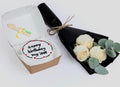 Ward and Haneen birthday bento cake with white roses bouquet, featuring colorful cake slices and elegant floral arrangement.