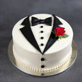 Ward and Haneen Dapper Gentleman Tuxedo Cake, 7 or 9 inch, featuring elegant tuxedo design with smooth frosting and decorative accents.