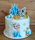 Frozen Dreams Enchanted Birthday Cake by Ward and Haneen, 7 or 9 inch, decorated with colorful Frozen-themed icing and toppers.