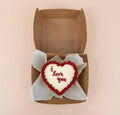 Mini Love You Heart Bento Cake by Ward and Haneen with a heart-shaped design and colorful frosting, perfect for special occasions.