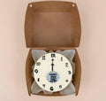 Mini Bento cake featuring a Happy New Year 2026 clock design by Ward and Haneen, with colorful festive decorations.