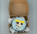Blue Powerpuff Girls Bubbles mini bento cake by Ward and Haneen with colorful character decorations on top.